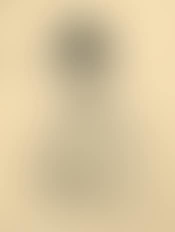 Man with dark hat and folded arms (preview)