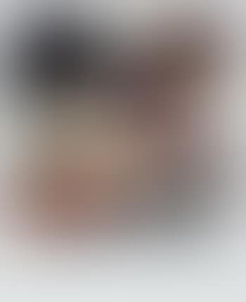 Nude model reclining on a bed (preview)
