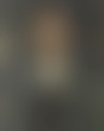 Portrait of a man in a bow tie smoking a pipe (preview)