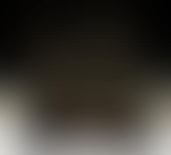 Two seated figures against wall (preview)
