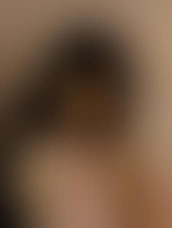 Portrait of a young woman with long dark hair (preview)