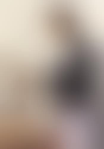 Young woman spinning thread (preview)