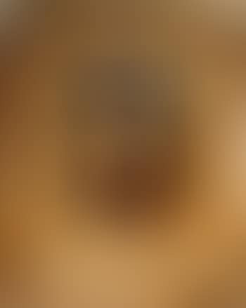Portrait of a young country girl in a cane-seat chair (preview)