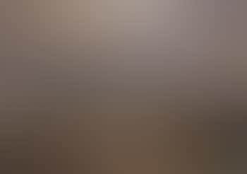 Coastal landscape with storm approaching and reflection of sun in water (preview)