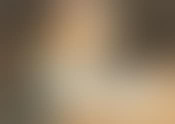Blonde haired girl reading book at table (preview)