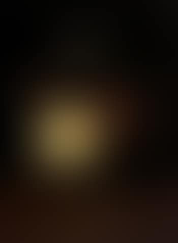 Rose in a glass on a table (preview)