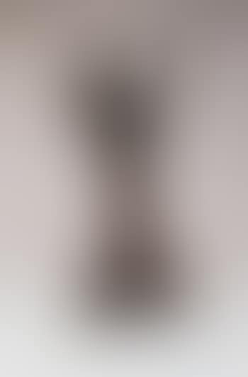 Woman kneeling with raised arms (preview)