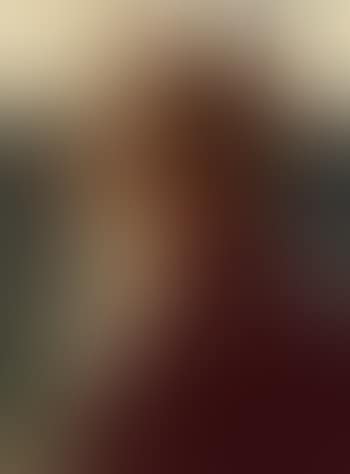 A man seen in profile with a window and a bottle in the background (preview)