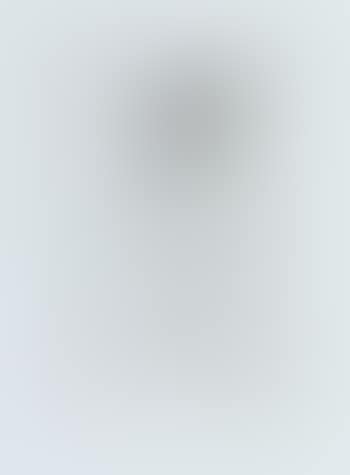 Antoinette standing, looking into a hand mirror (preview)
