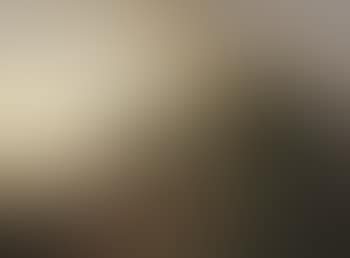 A mountainous landscape with a view on a town in the distance (preview)