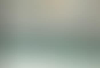 View of the sea with a sailing ship on the horizon, the sun breaks through the clouds (preview)