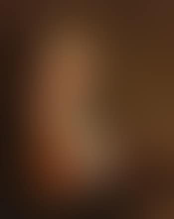 An old woman holding a Purse by candlelight (preview)