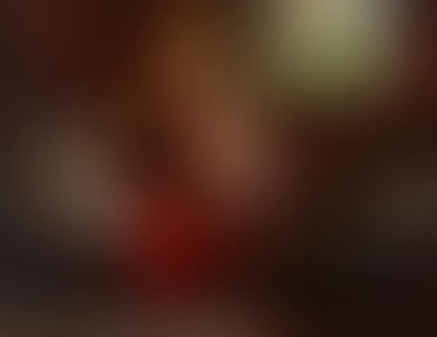 A mother tending her child in a sunlit interior (preview)