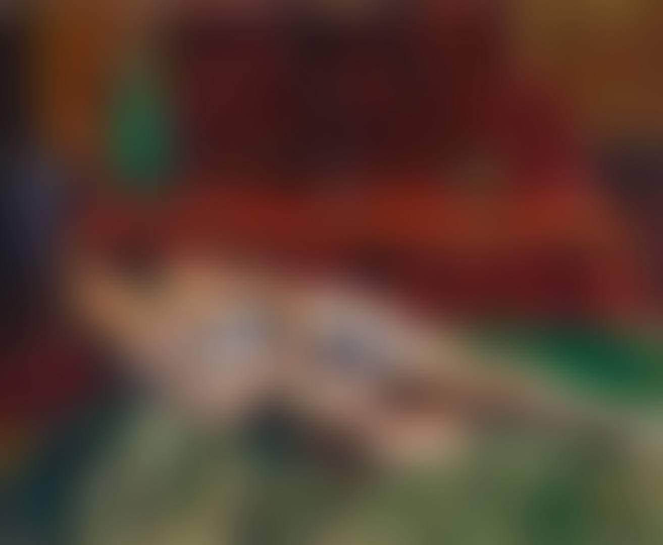 A FIGURE RECLINING ON A COUCH (preview)