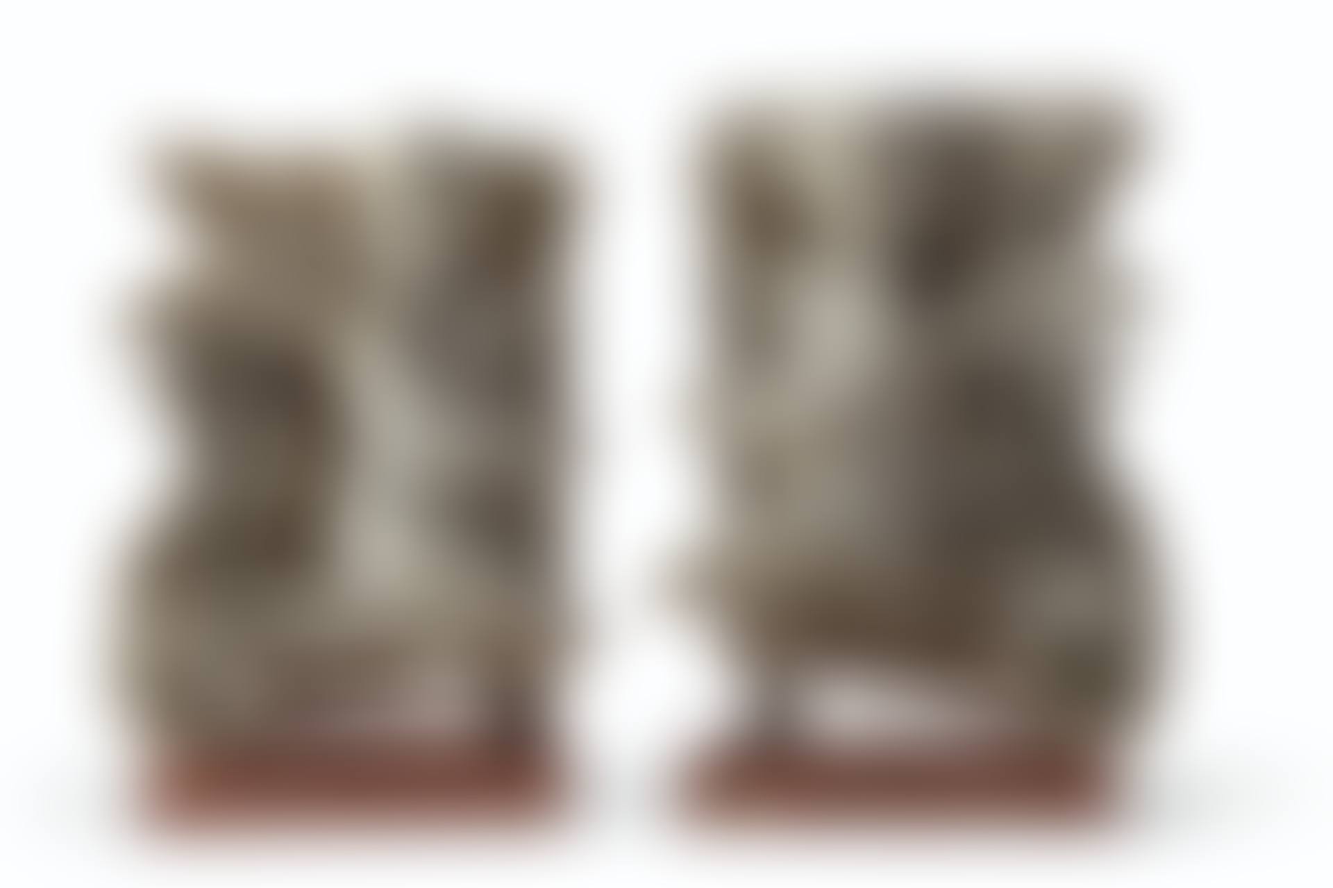 A PAIR OF WHITE MARBLE RELIEF SCULPTURES OF PUTTI (preview)
