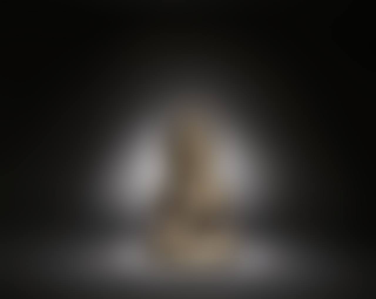 A GILT BRONZE SEATED FIGURE (preview)