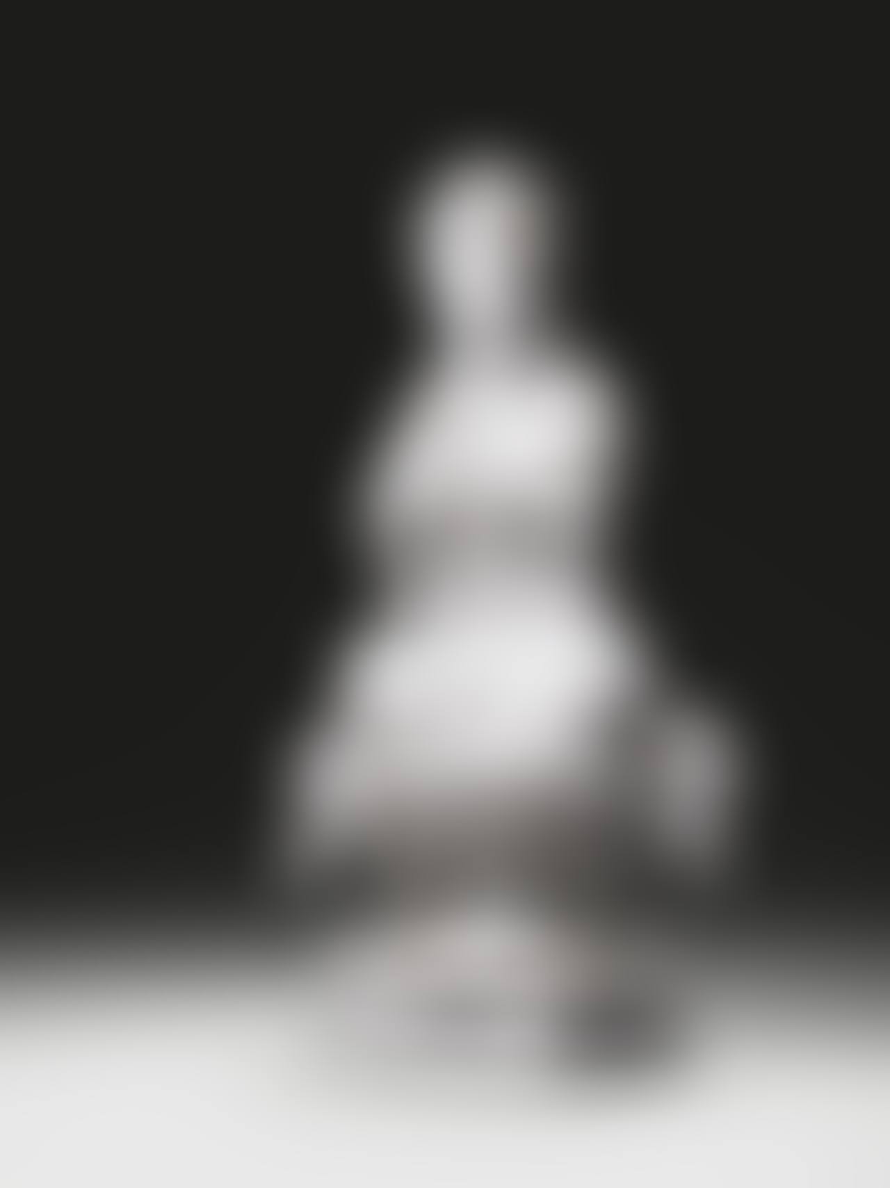 A WHITE DEHUA PORCELAIN FIGURE OF SITTING GUANYIN HOLDING A RUYI <br/>18TH CENTURY (preview)
