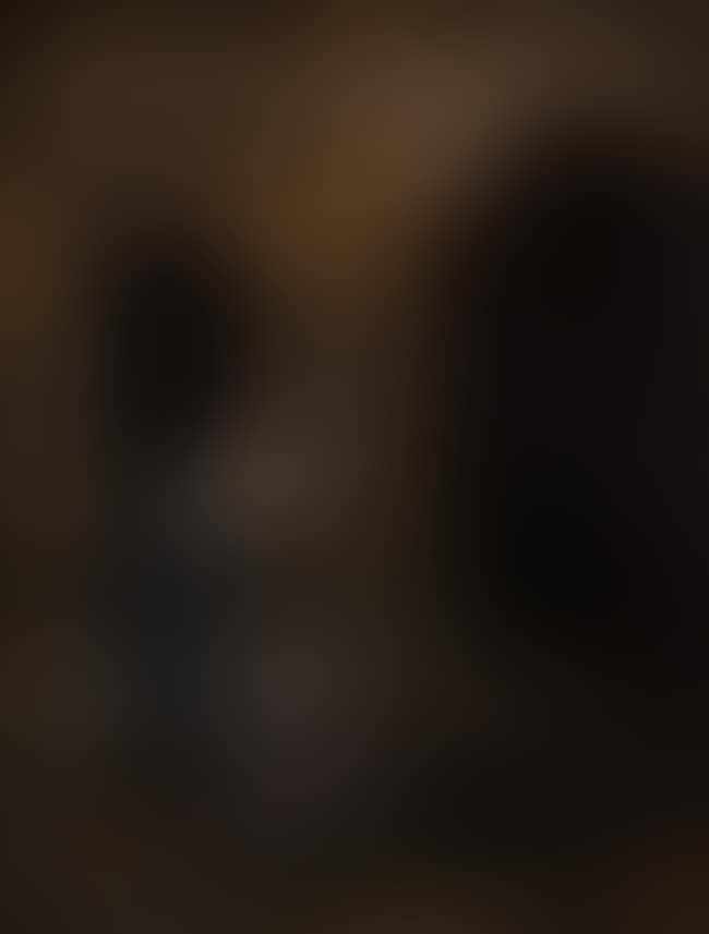 A man and woman by a doorway (preview)