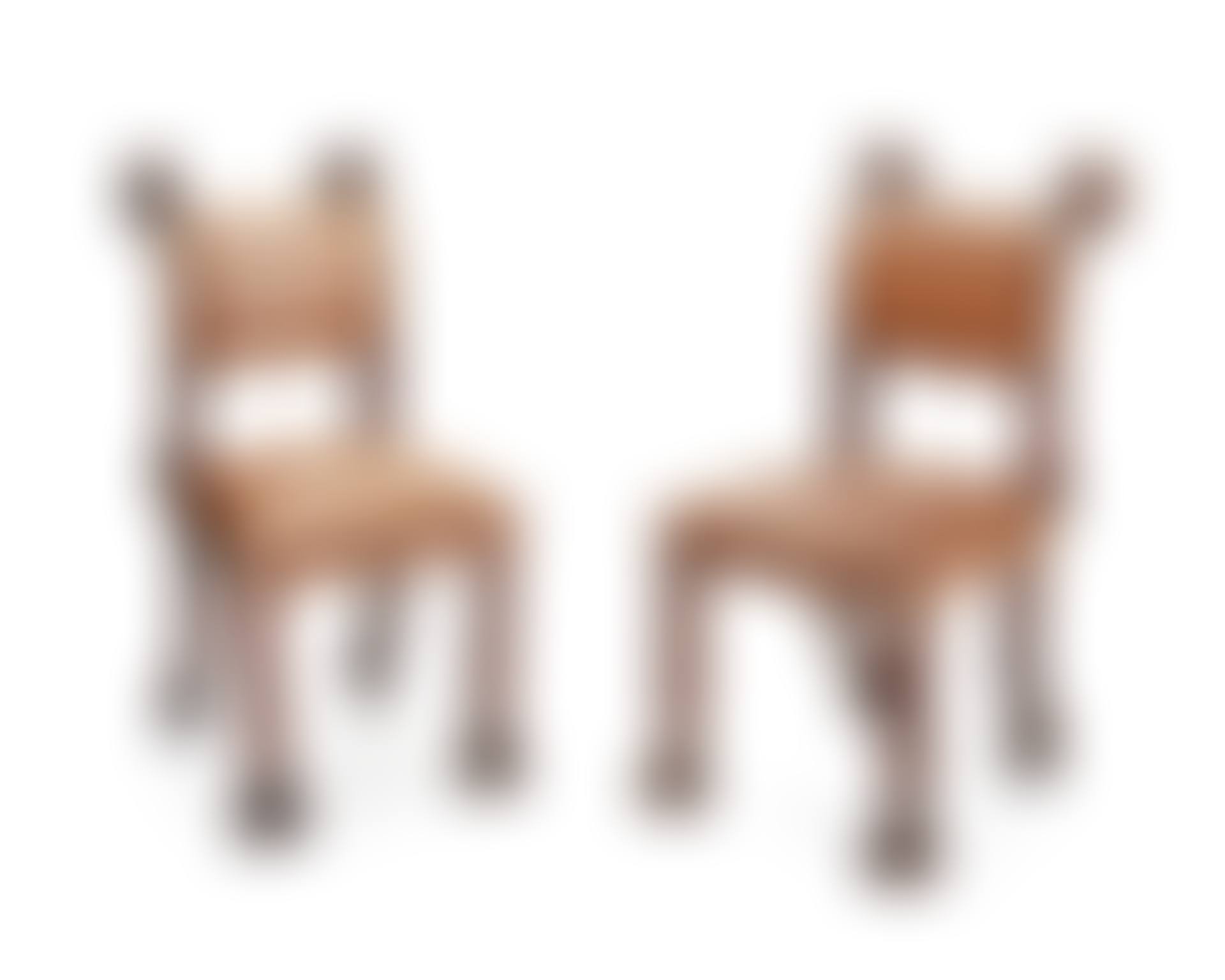 A pair of Continental Baroque-style carved wood side chairs (preview)