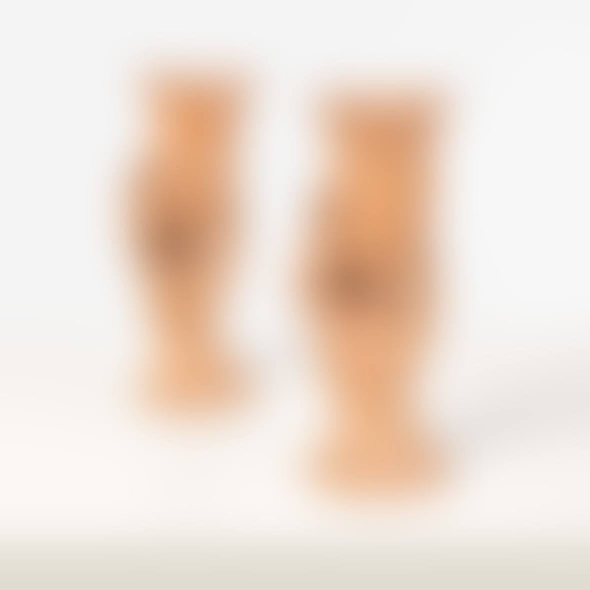 Pair of hands holding a tulip (preview)