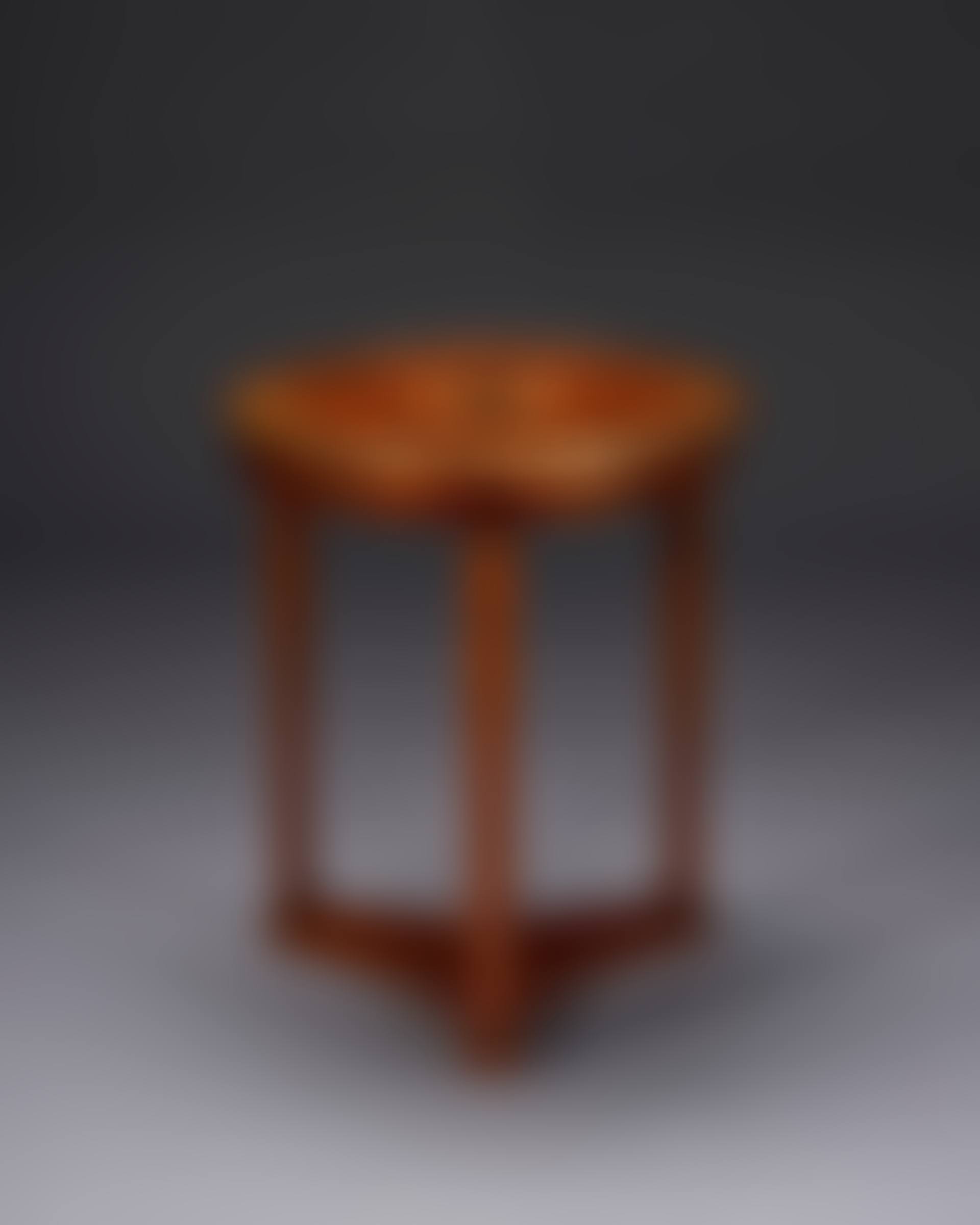 A CONSULAT ORMOLU-MOUNTED EBONY AND PEWTER INLAID FLAME MAHOGANY AND 'ACAJOU MOUCHETE' GUERIDON (preview)