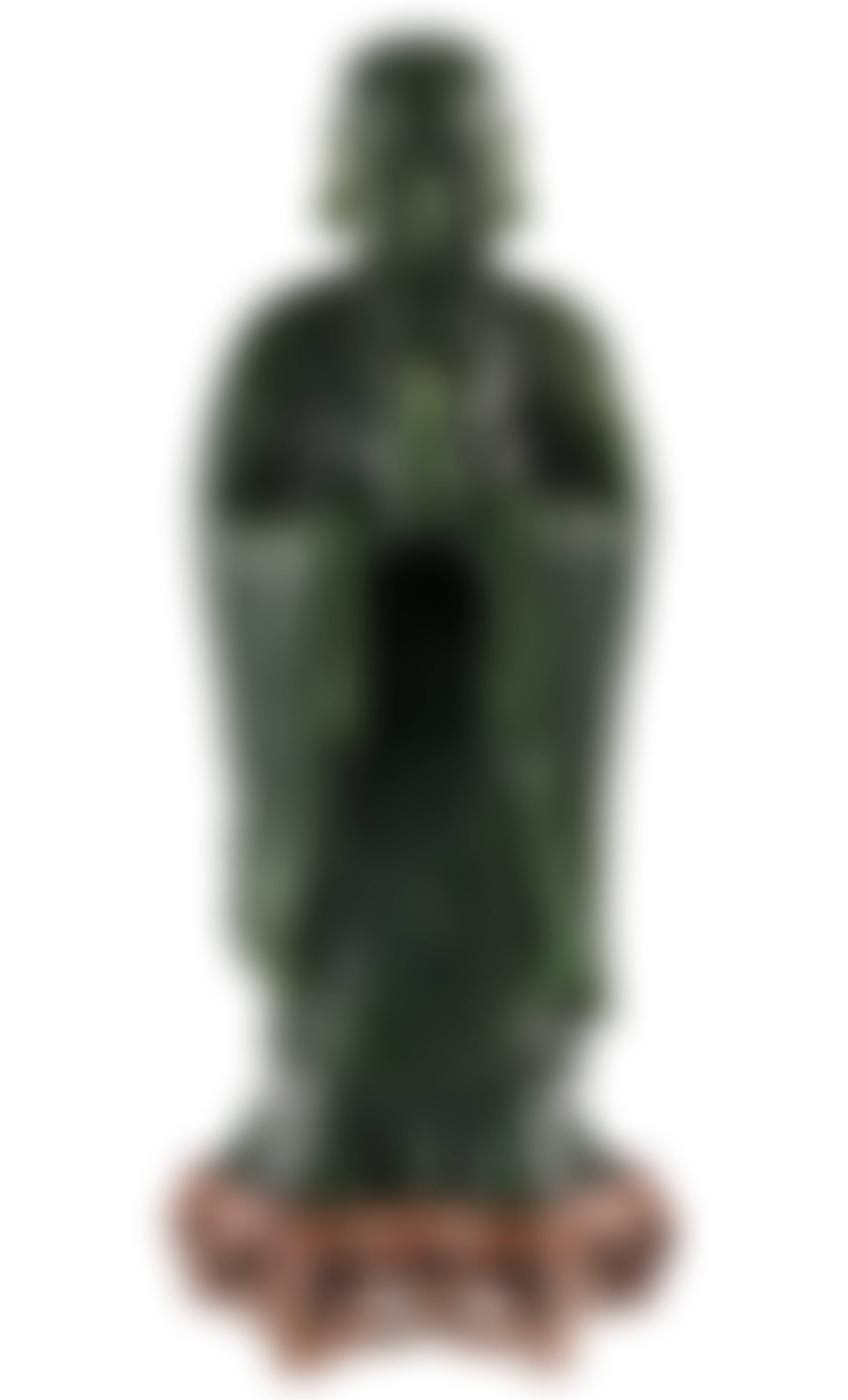 A DARK GREEN JADE CARVING OF ANANDA (preview)