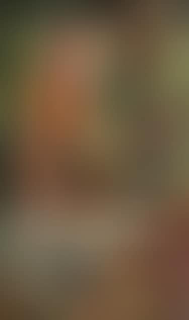 Young woman in her garden (preview)