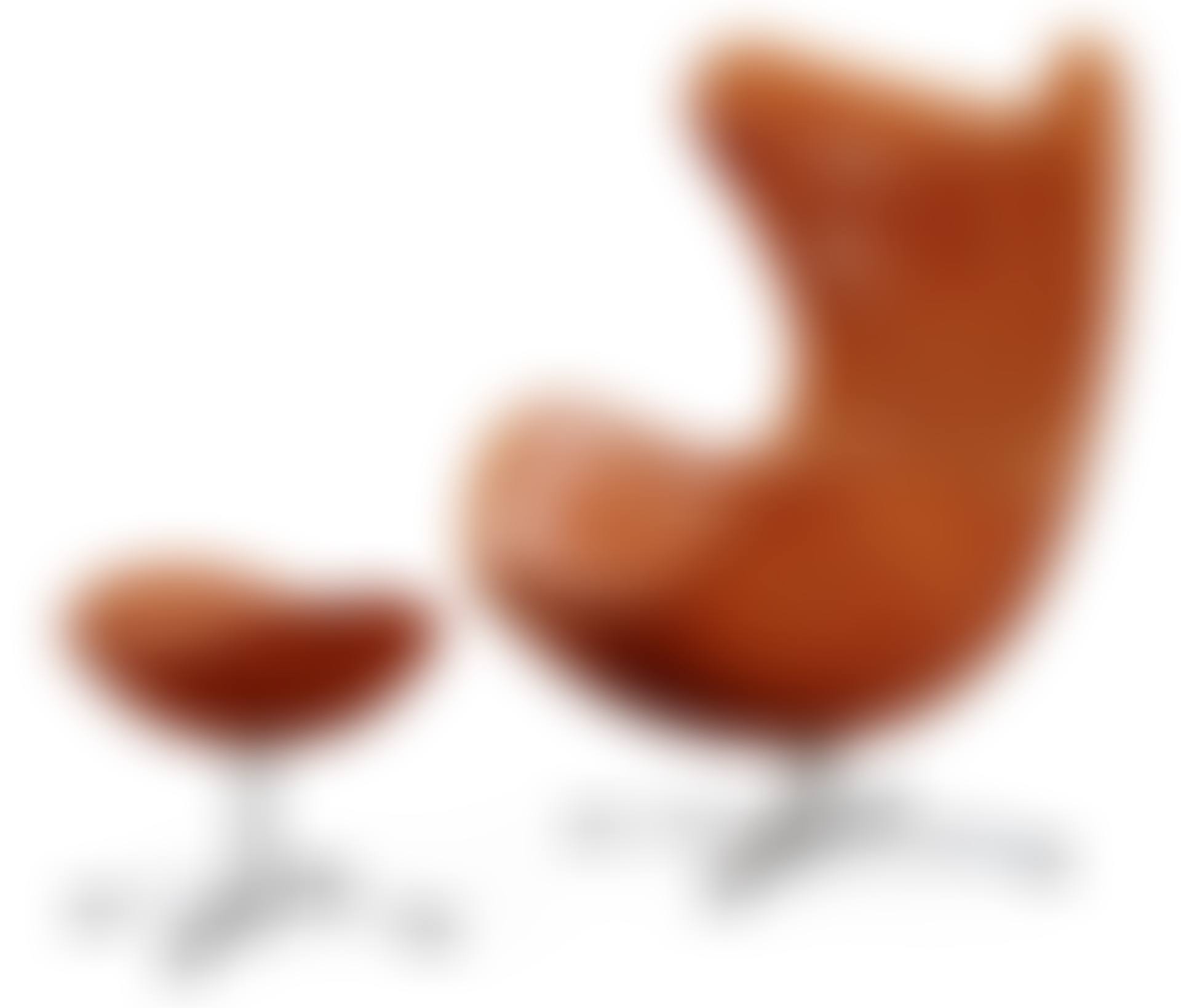 An Arne Jacobsen brown leather "Egg" chair and ottoman (preview)