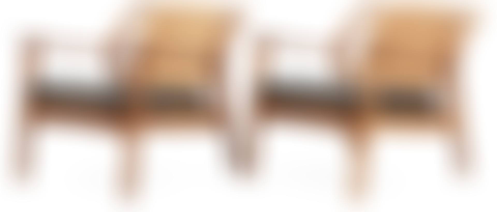 A pair of Danish teak and ratten armchairs (preview)