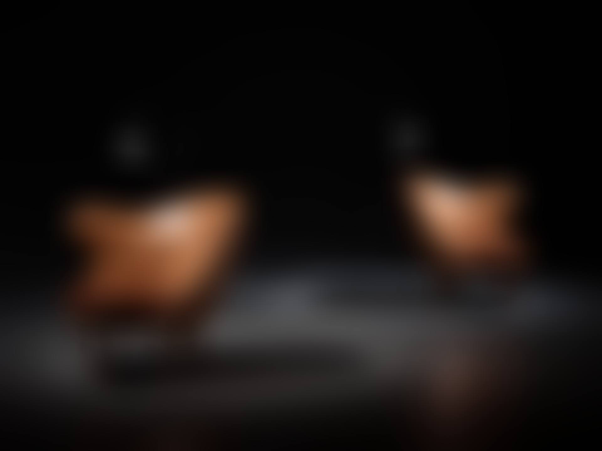 A pair of Arne Norell "Tummen/ The Thumb" easy chairs (preview)