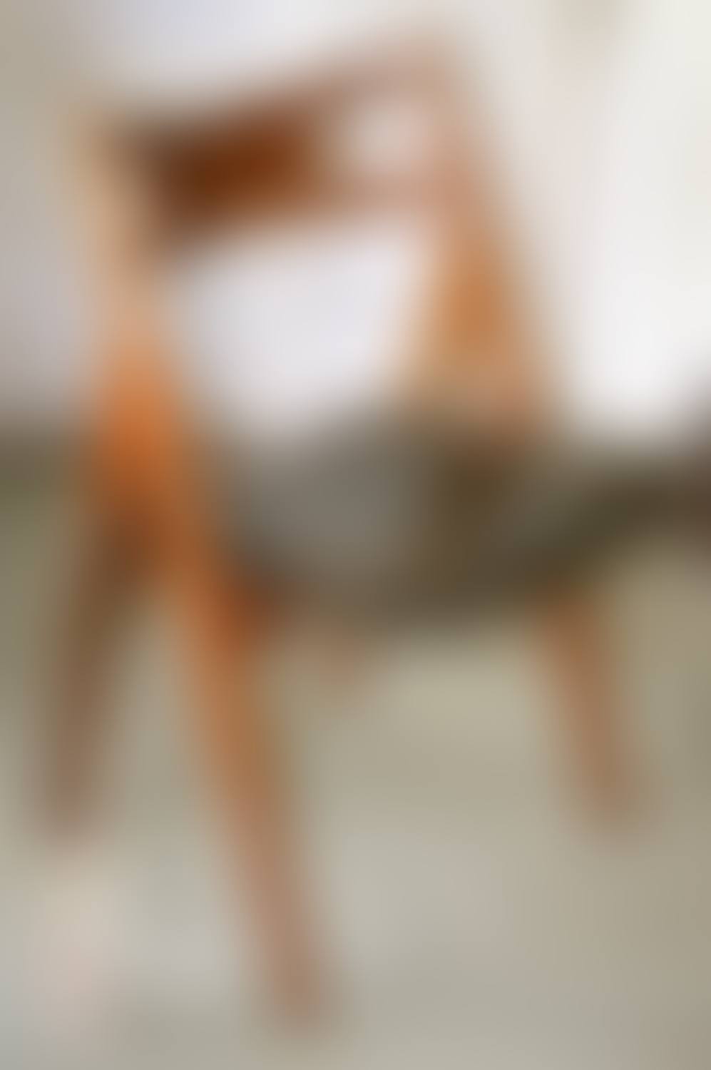 A HANS WEGNER TEAK FRAMED "SAWBACK" CHAIR (preview)
