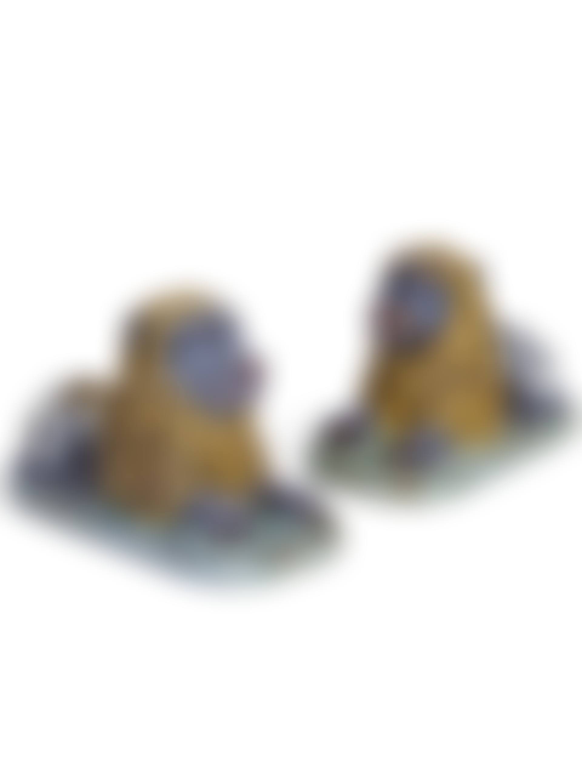 A PAIR OF FRENCH FAIENCE MODELS OF RECUMBENT LIONS (preview)