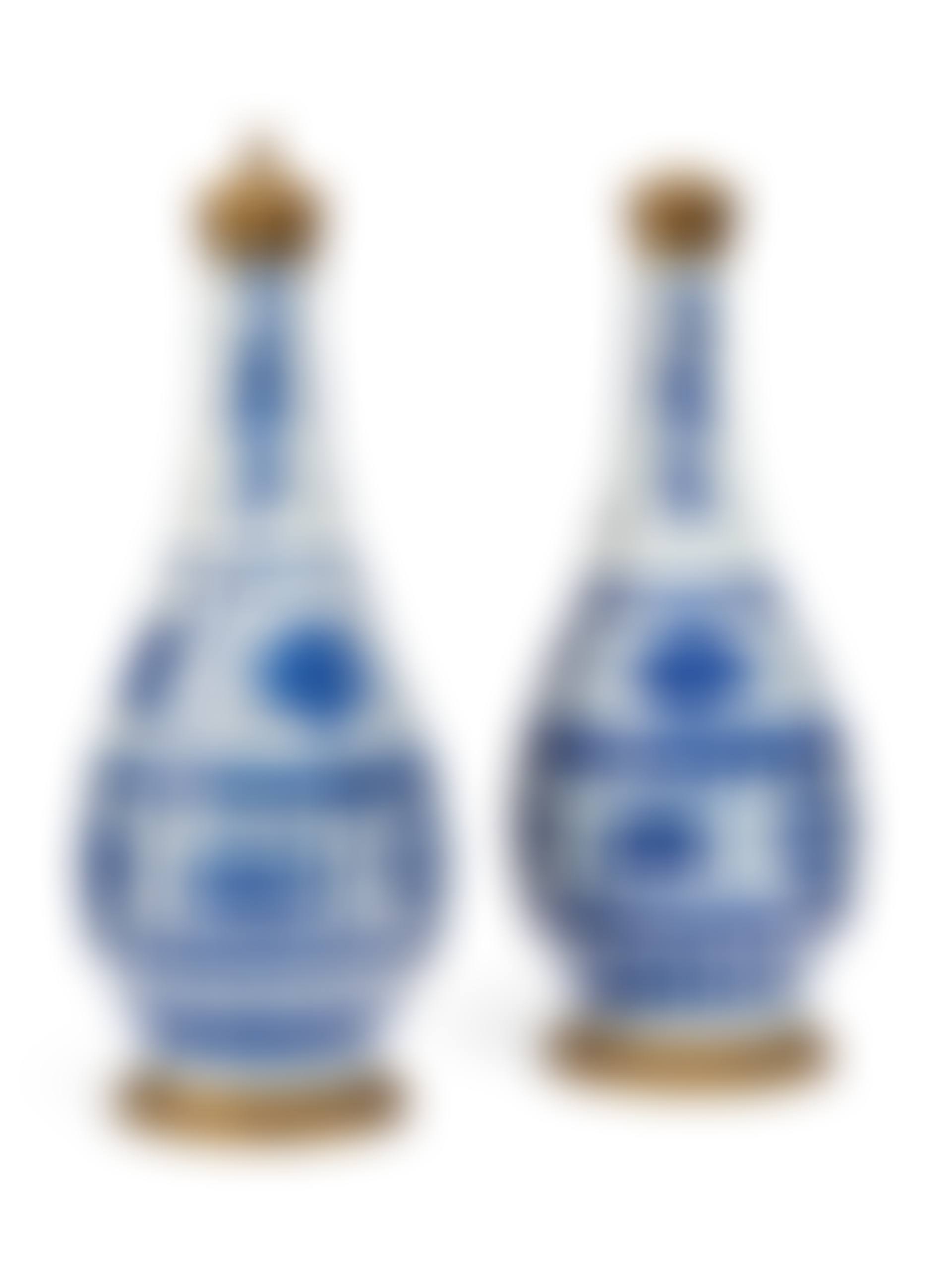 A PAIR OF ORMOLU-MOUNTED CHINESE PORCELAIN BLUE AND WHITE BOTTLE VASES (preview)