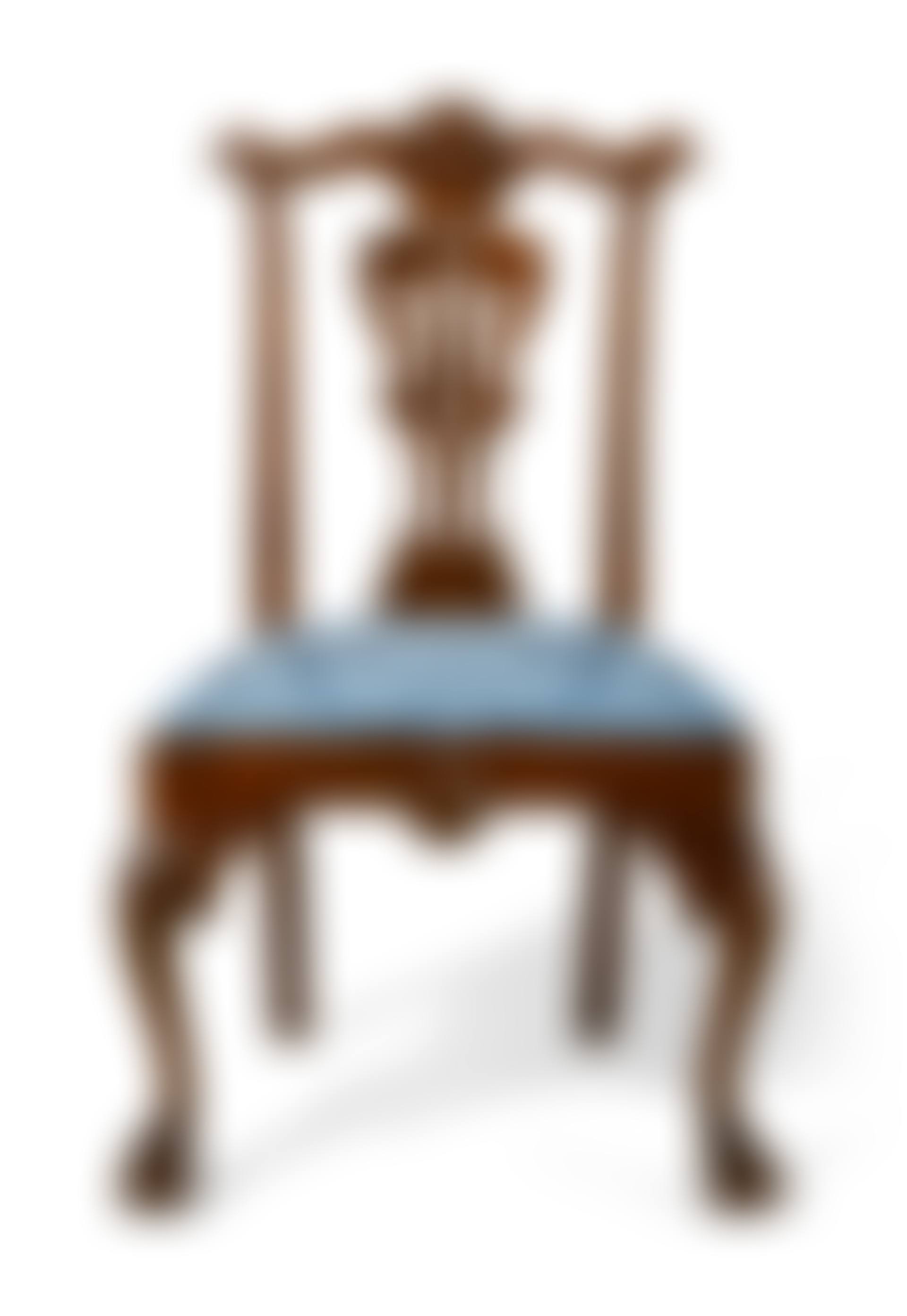 A PAIR OF CHIPPENDALE CARVED WALNUT SIDE CHAIRS (preview)