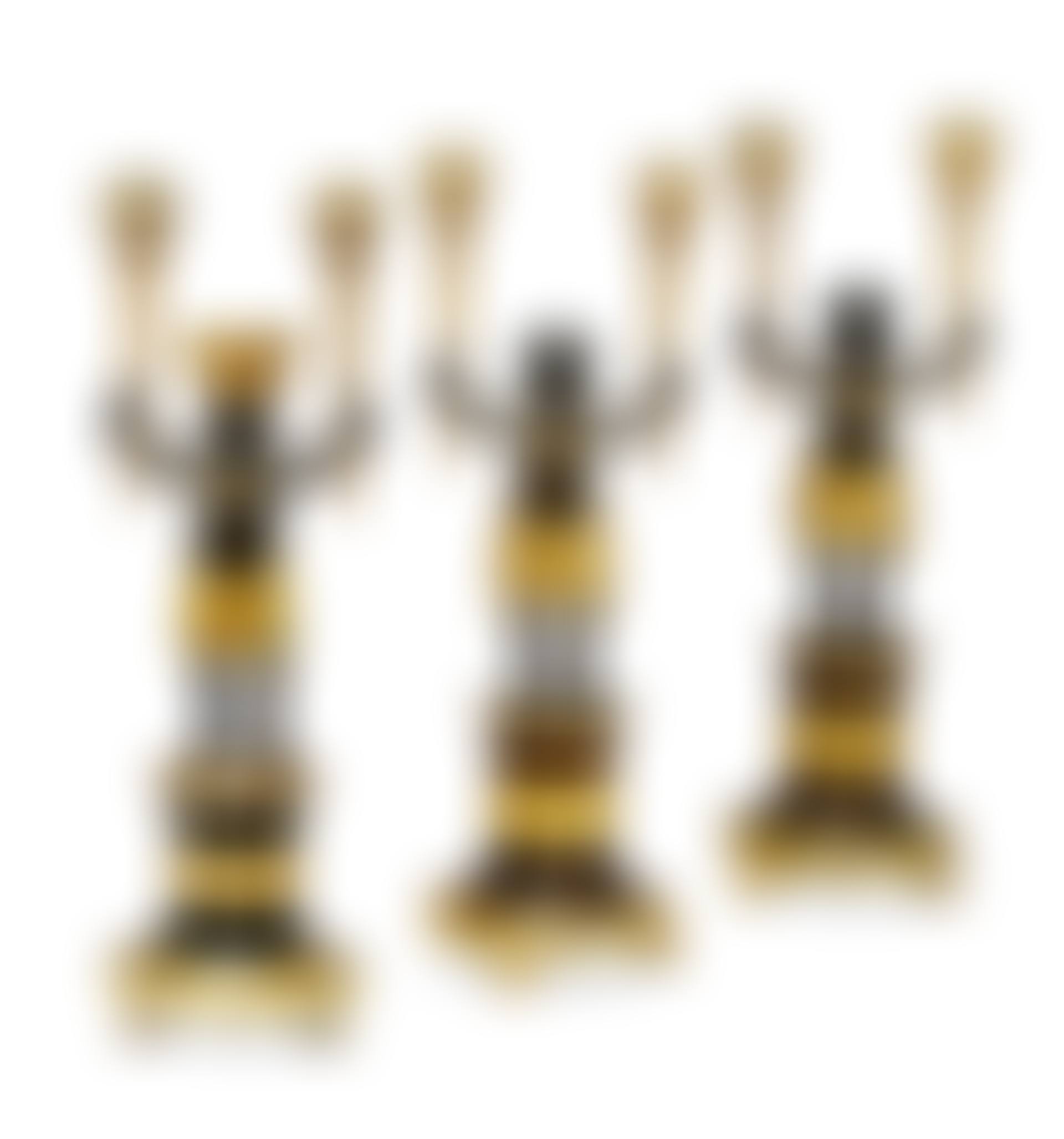 A GROUP OF THREE DIRECTOIRE ORMOLU AND PATINATED BRONZE TWIN-BRANCH CANDELABRA (preview)