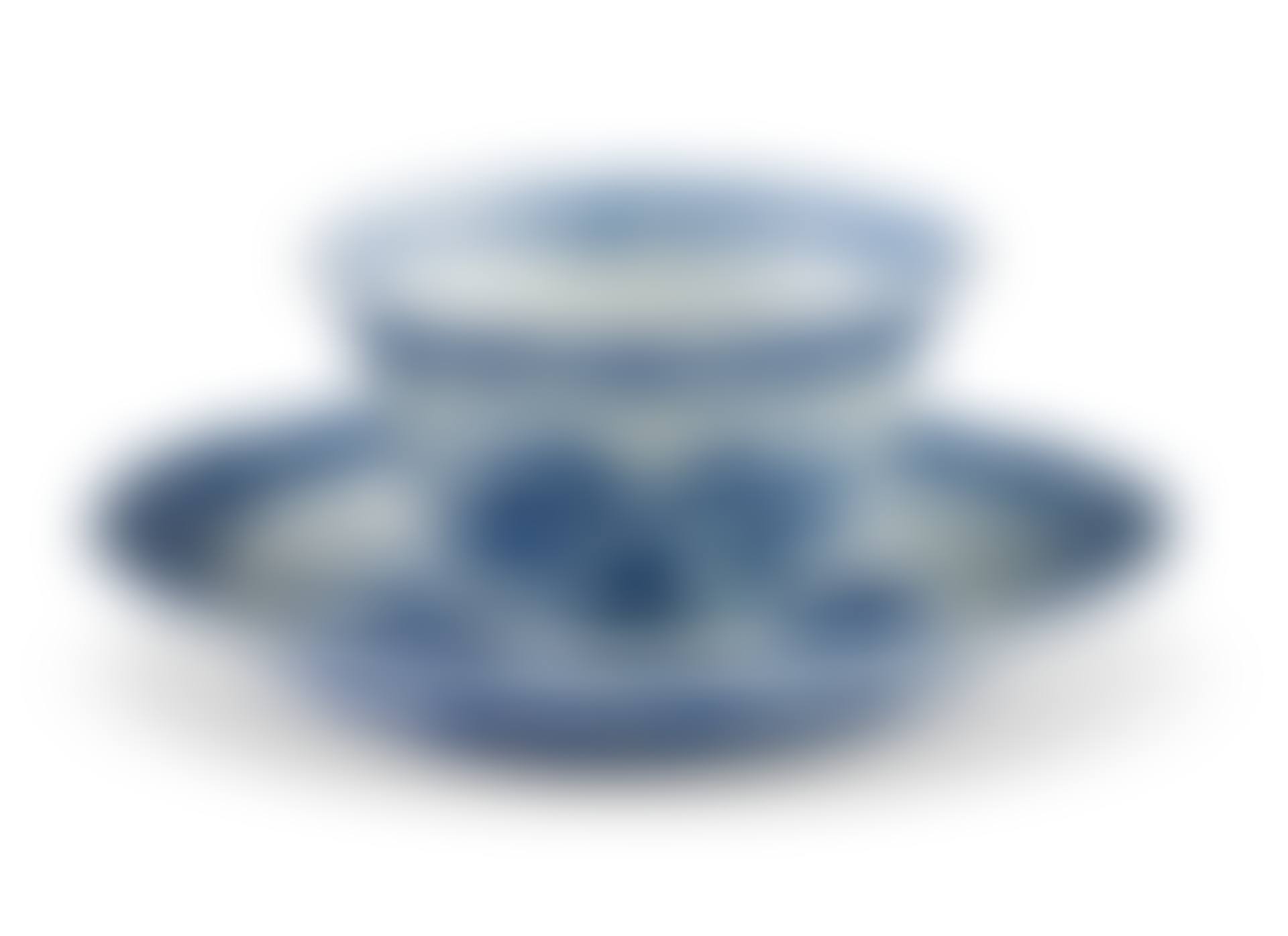 A CHINESE EXPORT PORCELAIN BLUE AND WHITE LOTUS-MOLDED 'ACUPUNCTURE' TEABOWL AND SAUCER (preview)