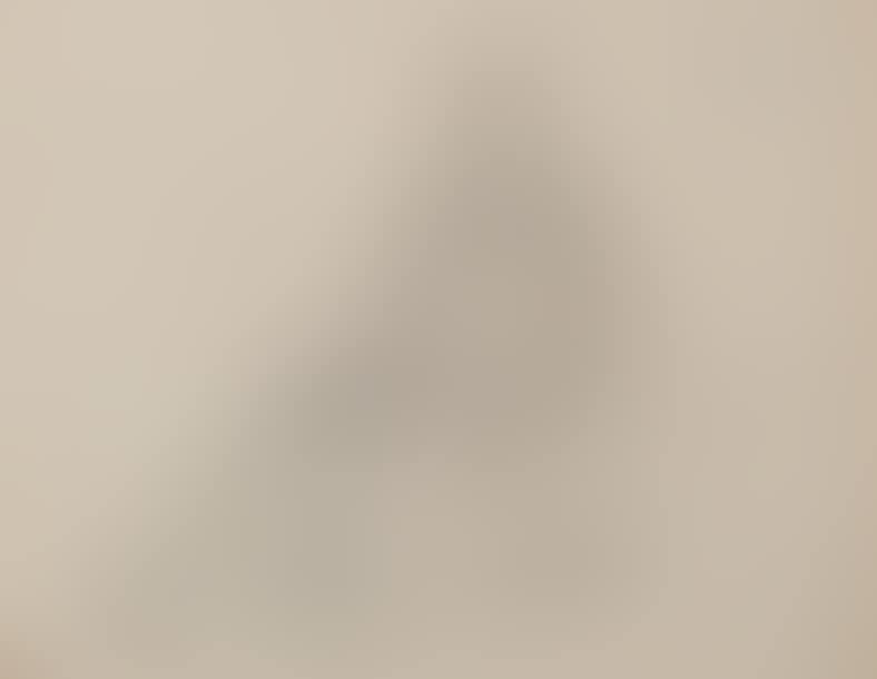 Young girl sitting on a couch (preview)