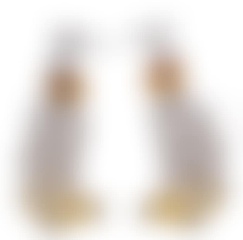 whippets seated on yellow cushions decorated with tassels and wearing collars with tassels (preview)
