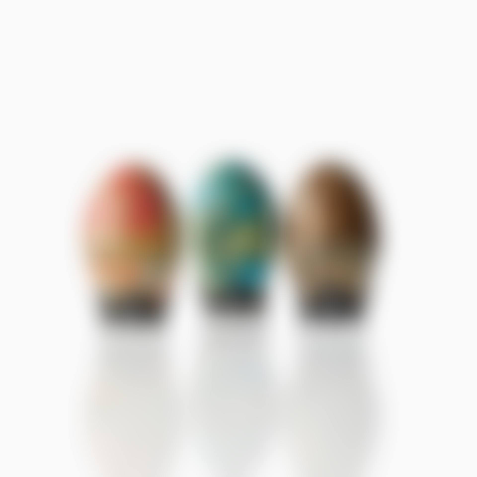 Sculptures in the form of eggs, three pieces; A set of three Hans Hedberg faience egg sculptures (preview)