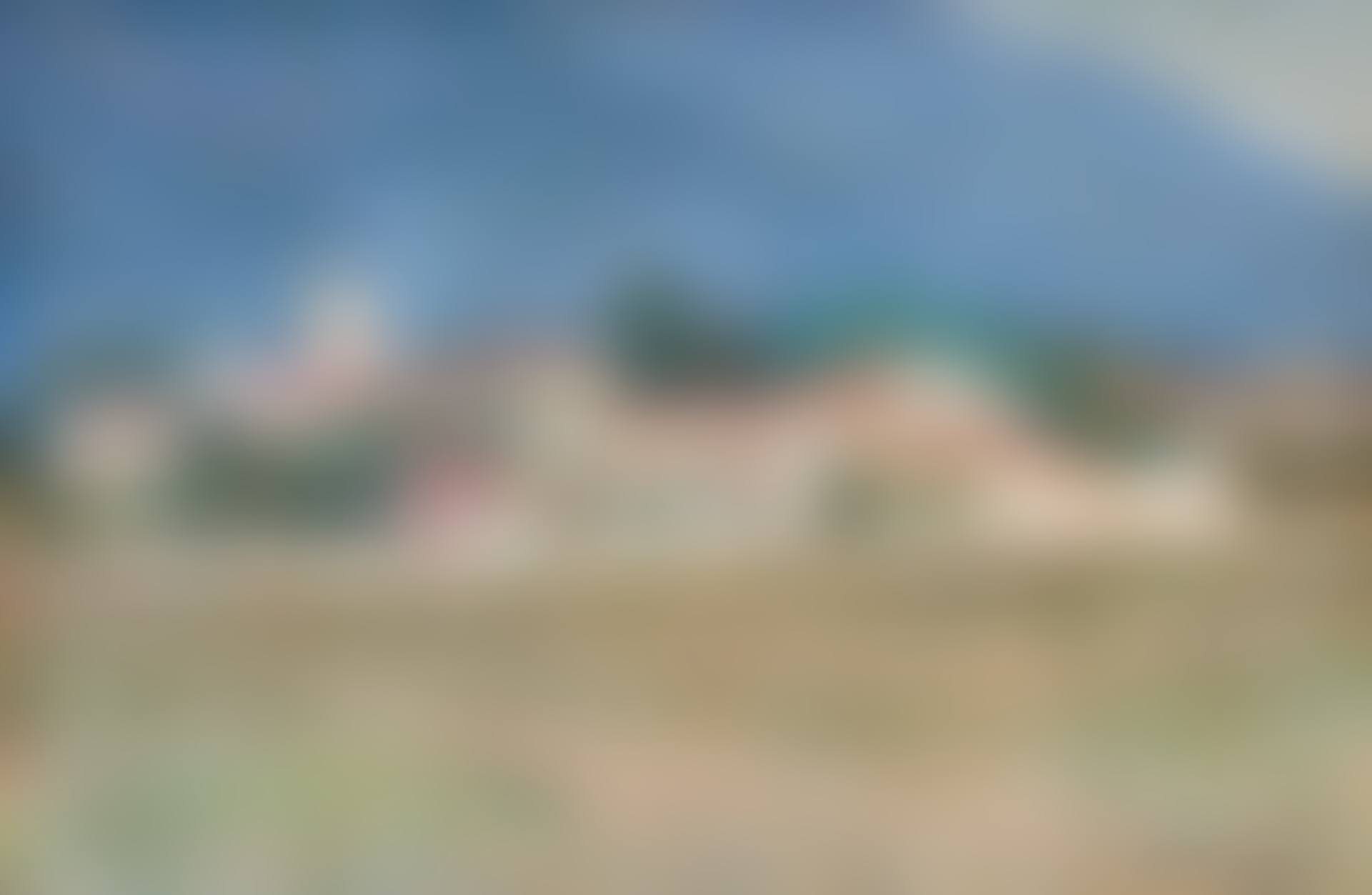 View towards a French village, in the background a mountain (preview)