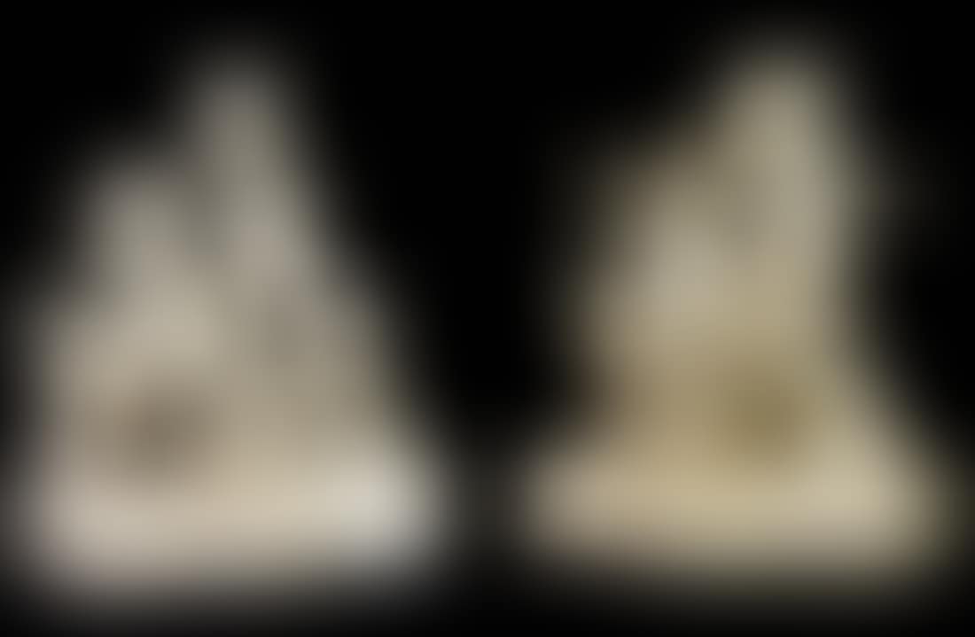 Pair of Italian glazed ceramic figural groups of putti (preview)