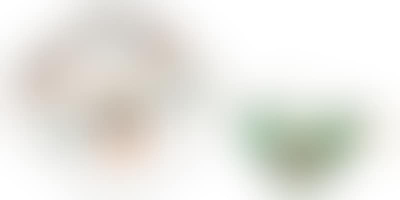 Quatrefoil cup with sea green background and "rock and bird" painting (preview)