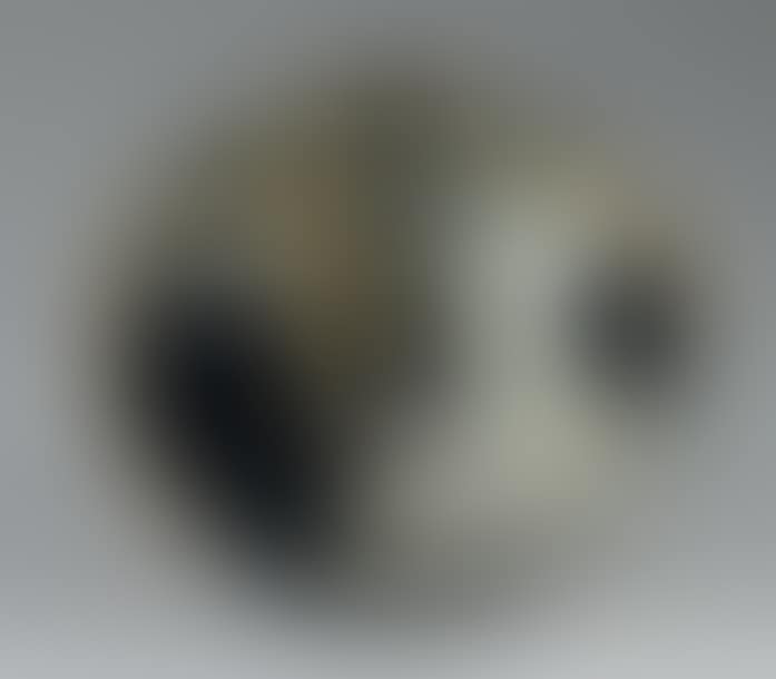 Vase with spherical body in pewter dinanderie entirely hammered with large facets (preview)