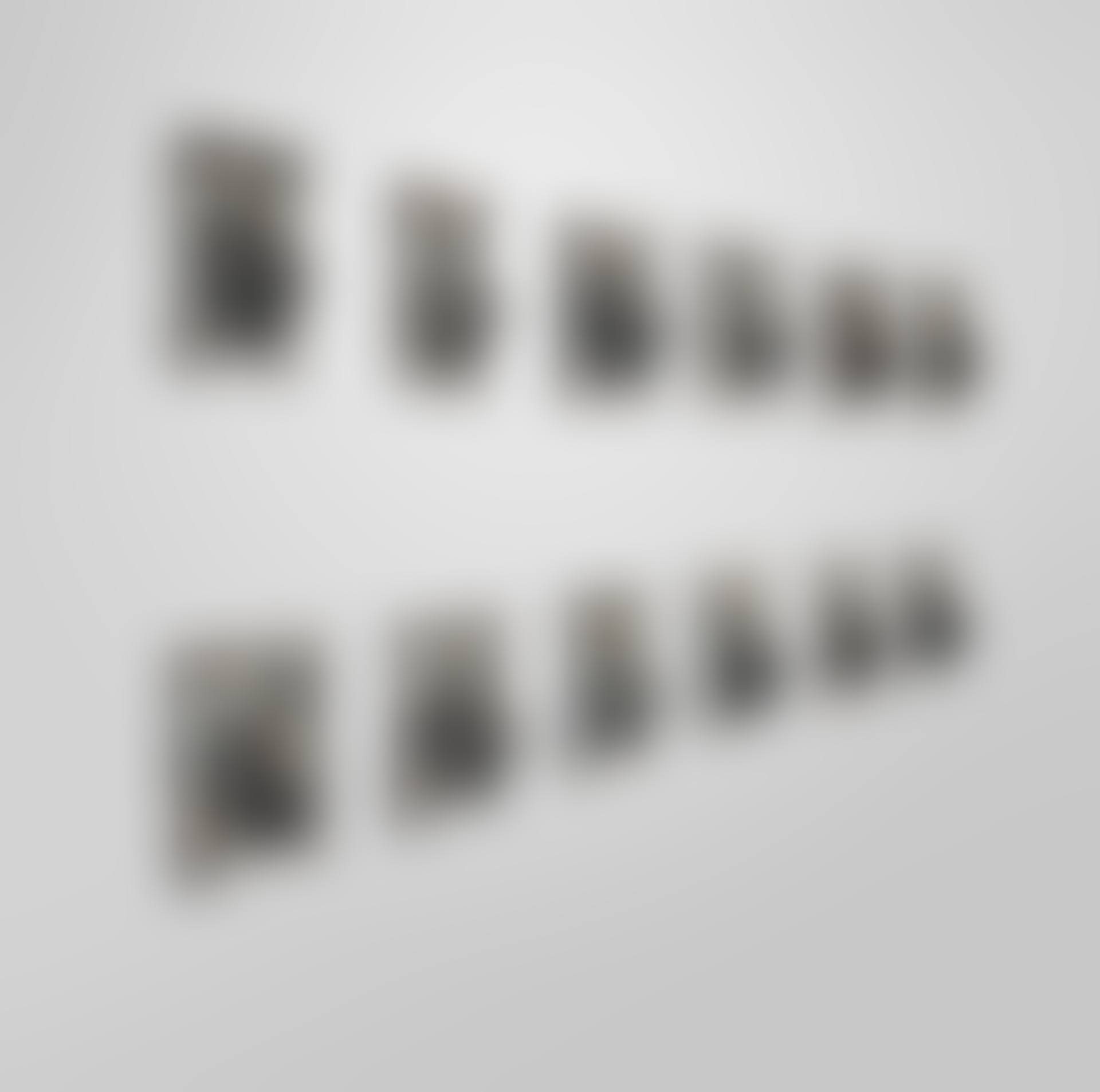 A SET OF TWELVE LEAD LION HEAD ARCHITECTURAL ELEMENTS (preview)