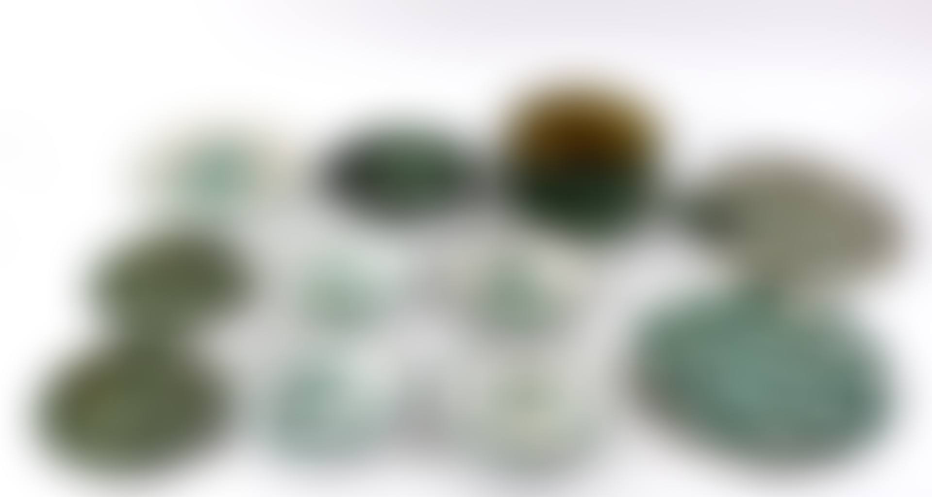 a set of four tin glazed circular dishes (preview)