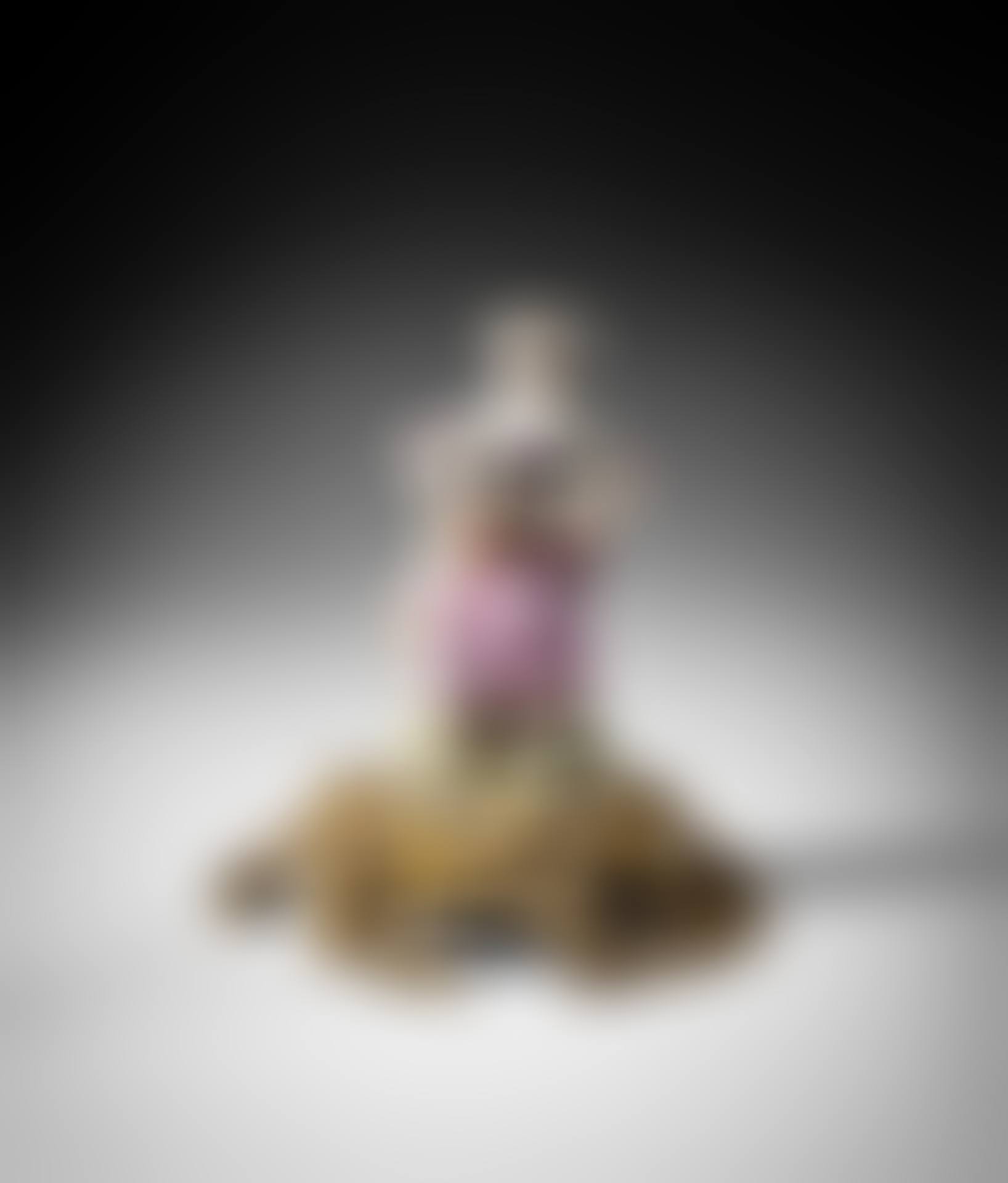 Porcelain statuette representing Colombine seated (preview)