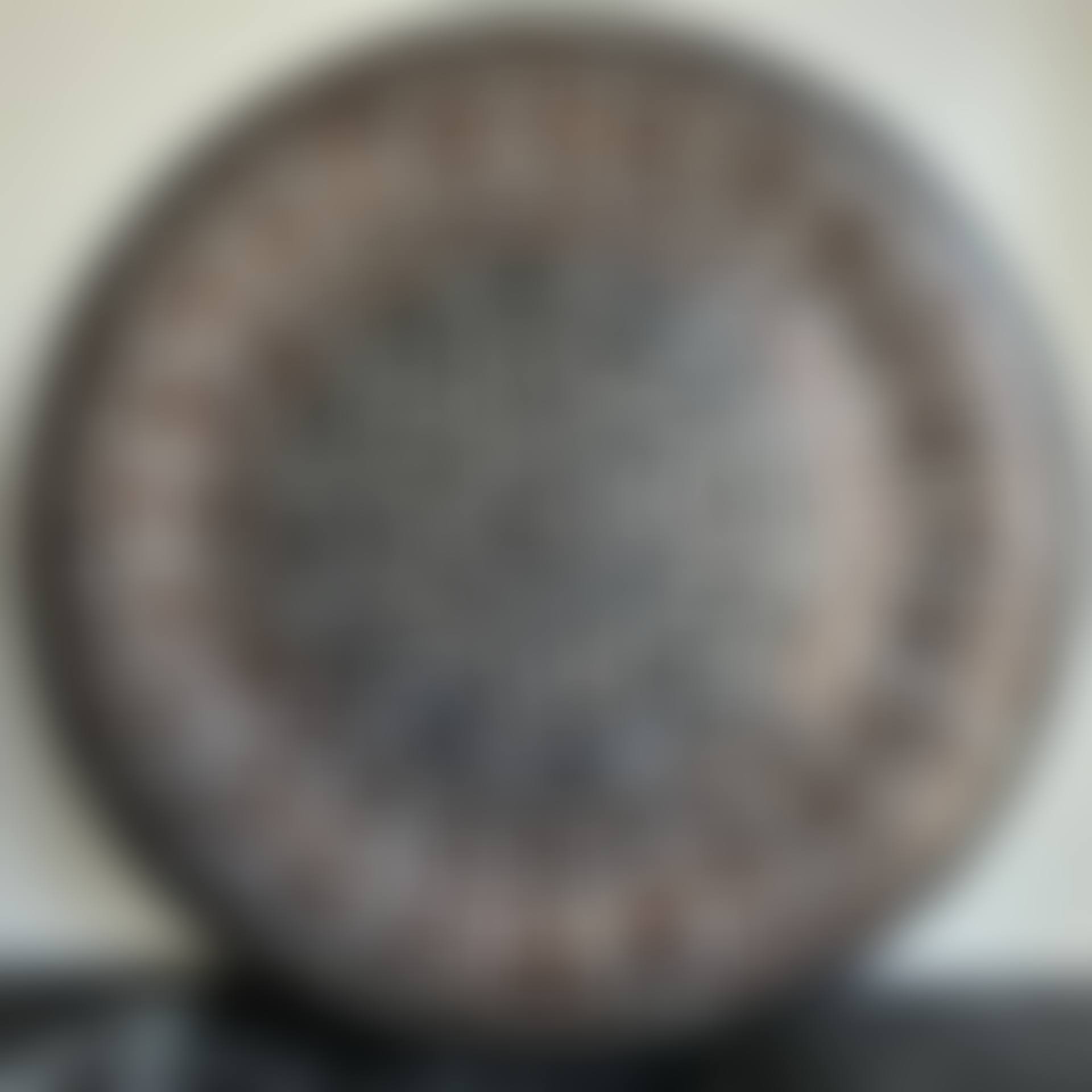 Large copper dish with inlaid decoration of a rosette and calligraphy (preview)