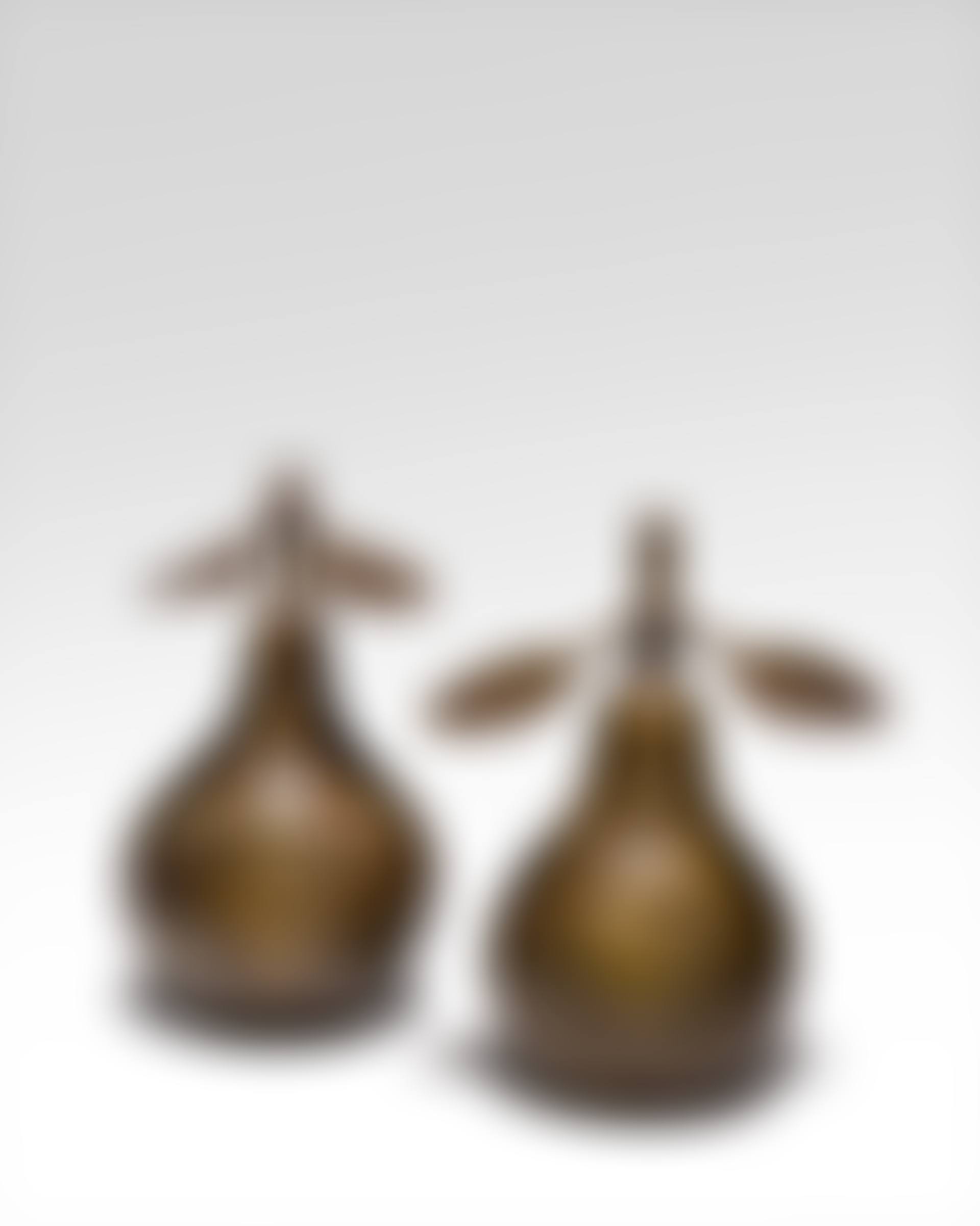 Two gold damascened steel pears, Persia, Qajar (preview)