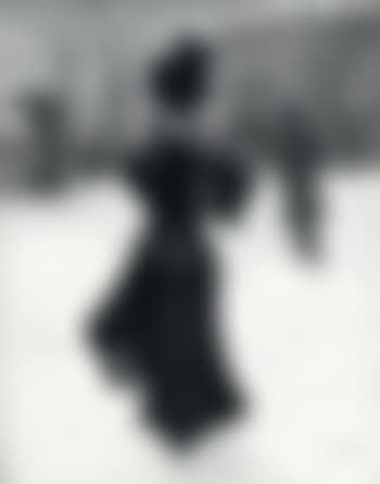 Elegant woman at Kongens Nytorv on a snowy day (preview)