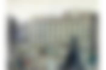 A Northern townscape with a tram, horse-drawn carriage and figures (preview)